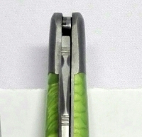 Coltello serramanico manico resina verde Laguiole en Aubrac